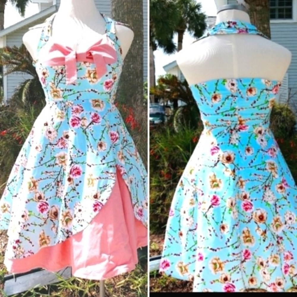Boutique Blue Floral and Pink Dress and looks AMAZING on
Size medium